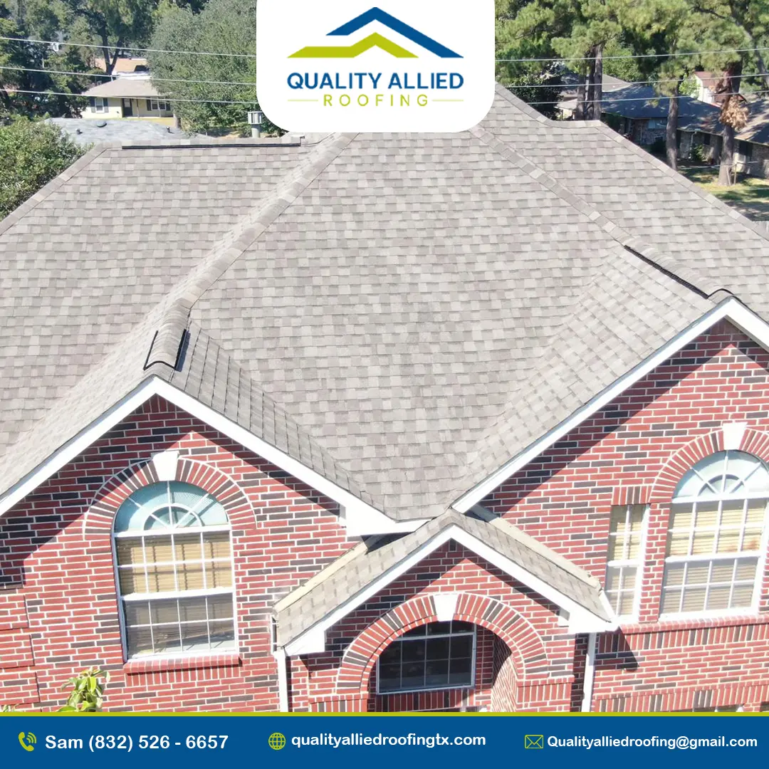 brick house with a gray shingle roof, one of Katy Roofing services project from Quality Allied Roofing