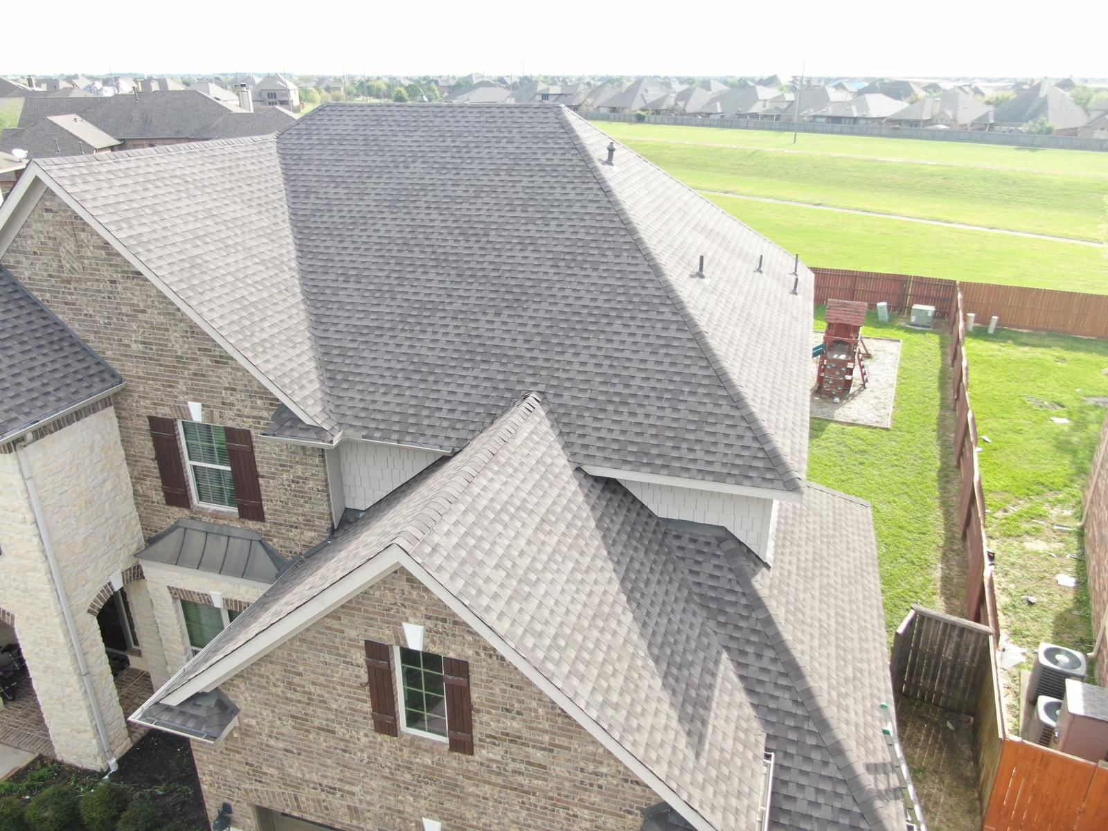 Aerial detail of residential roof slopes and gables