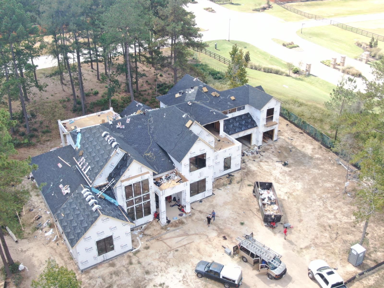 New construction roofing with underlayment visible