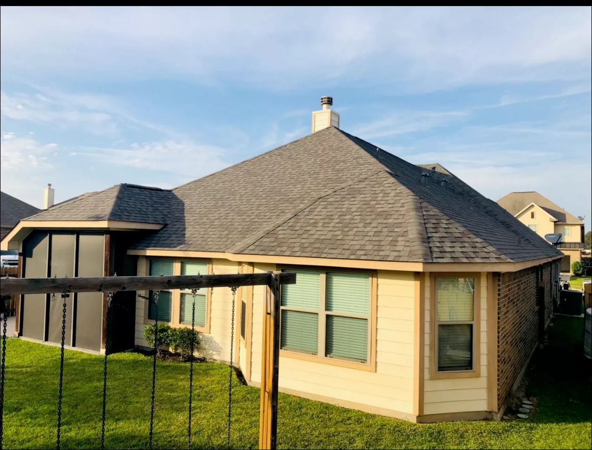 Rear view of residential shingle roofing